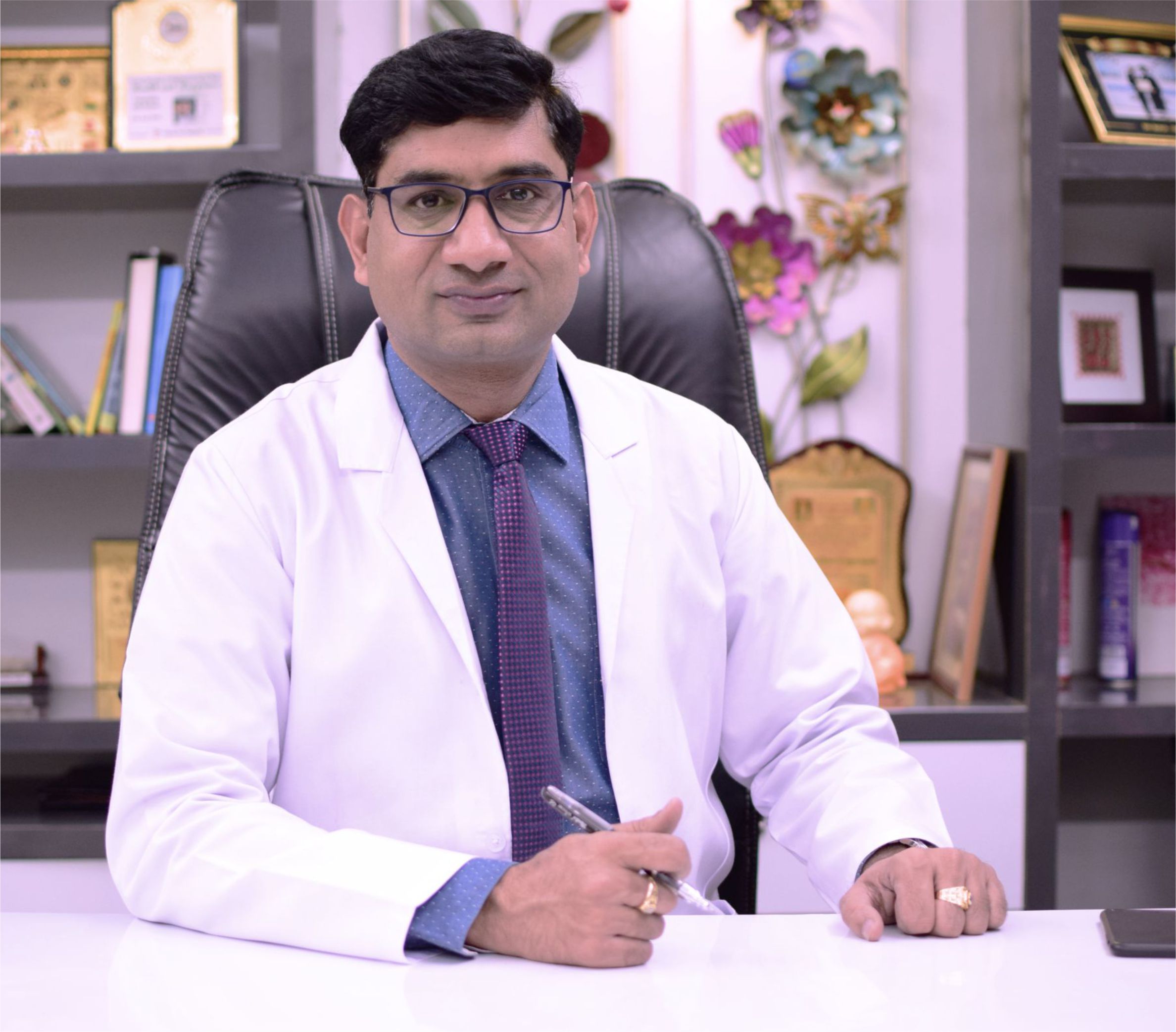 Dr Anil K Gupta MBBS MS PhD FFM